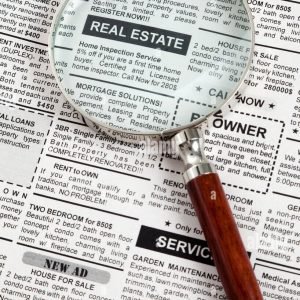 fake-classified-ad-newspaper-real-estate-concept-CPFGBC